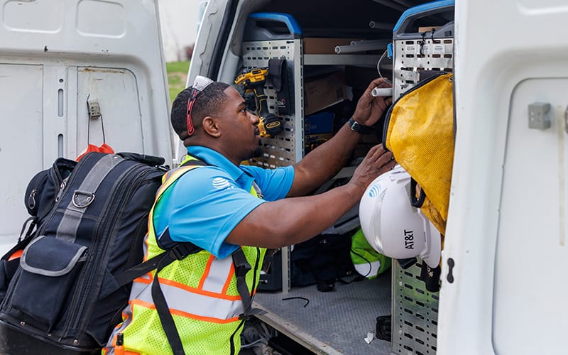 A technician installing internet