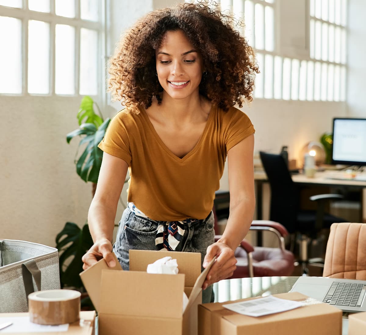 Woman packing the box