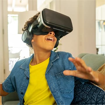 A boy playing VR game