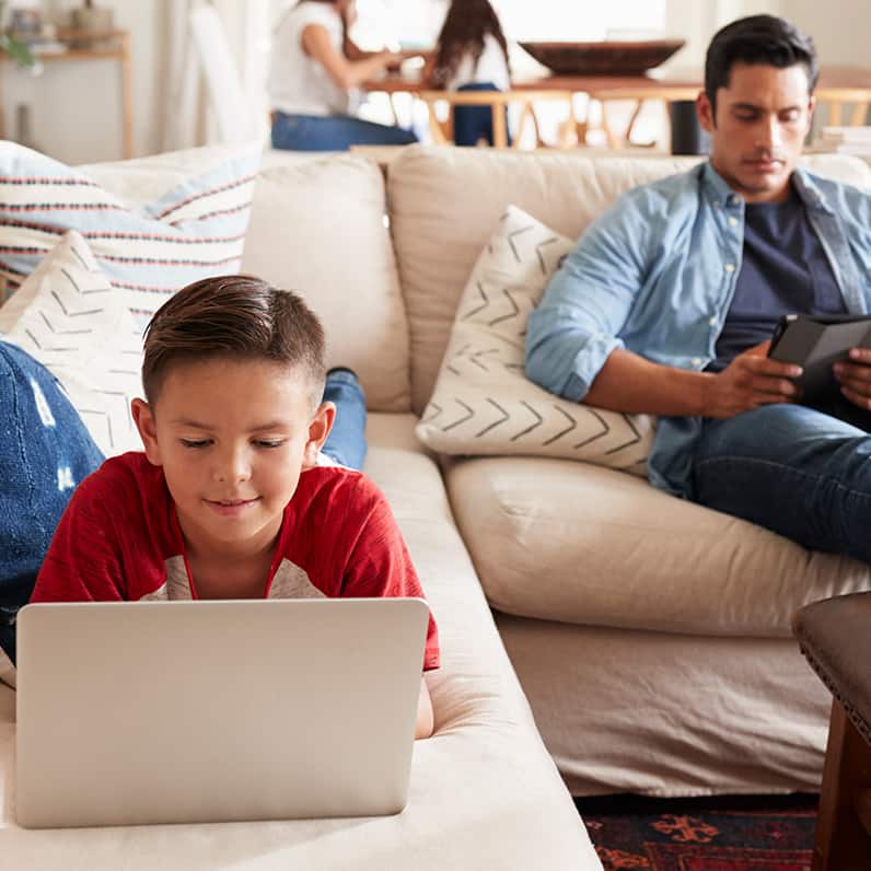 AT&T installation engineer wearing safety glasses preparing to assess a rural household for AT&T Fixed Wireless Internet